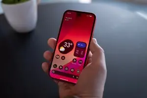 Illuminated screen of a Google Pixel 10A in someone’s hand.