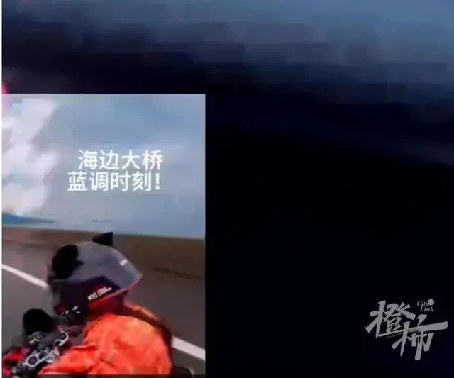 女骑手高速狂飙时速超200公里玩手机