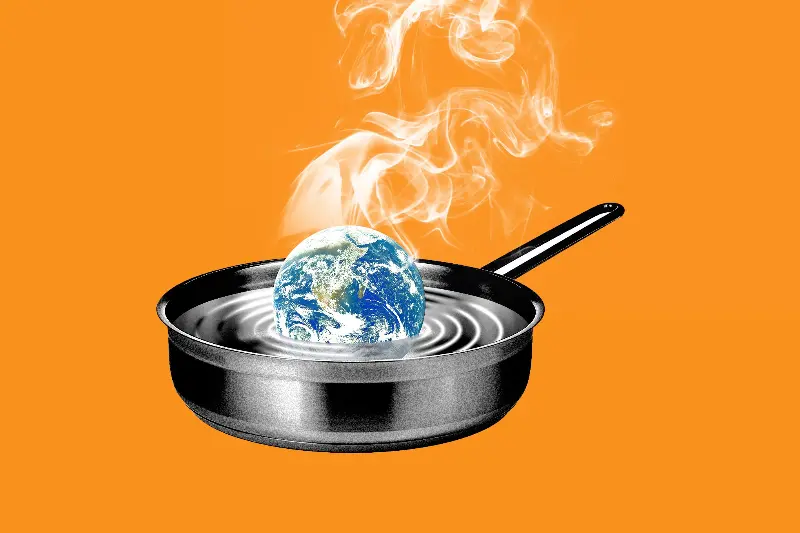 Photo illustration of earth in a heating pot of water.