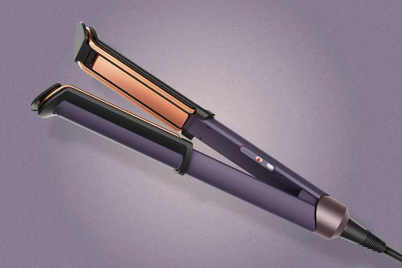 The Dyson Corrale CoolShine straightener against a purple background.