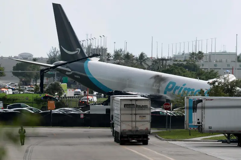 MIAMI, FLORIDA - SEPTEMBER 06: An Amazon cargo plane is seen after it crashed at Miami International Airport on September 06, 2026 in Miami, Florida. In a statement, the Federal Aviation Administration said Prime Air Flight 7598 overran the runway while landing around 2 p.m. after departing from Luis Muñoz Marín International Airport in San Juan, Puerto Rico, earlier today. (Photo by Joe Raedle/Getty Images)