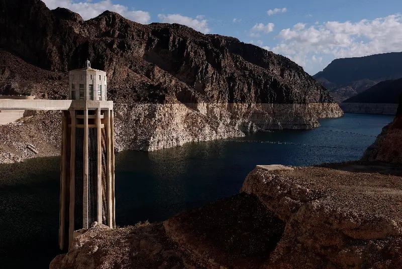 A view of a reservoir with a low water level.