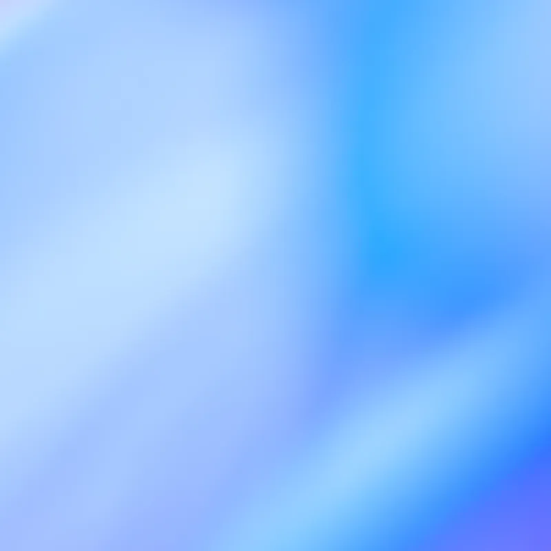 Abstract blue gradient background with soft transitions between light blue, cyan, and deep blue tones, creating a smooth, blurred effect.