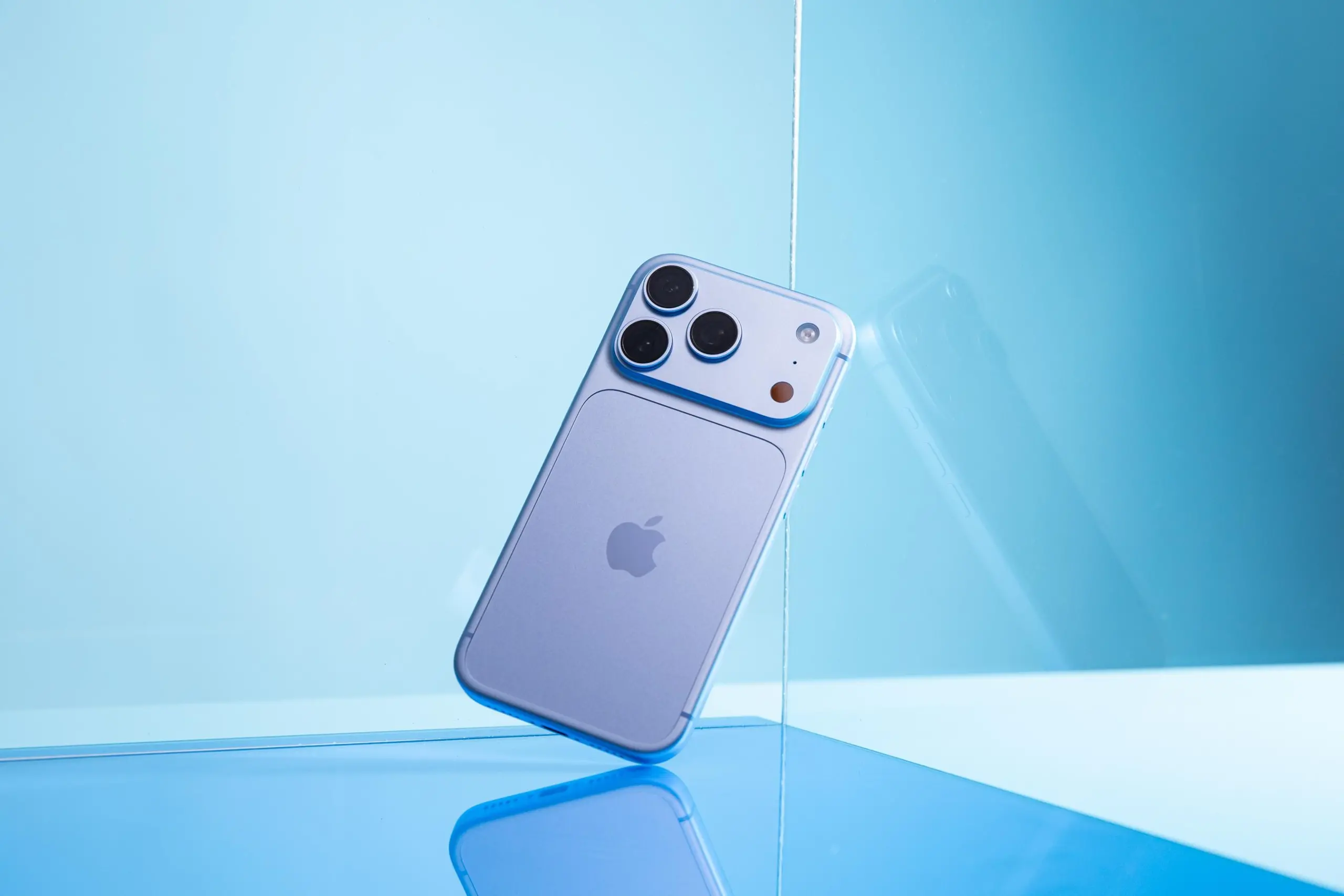 Blue iPhone 18 Pro on blue background.