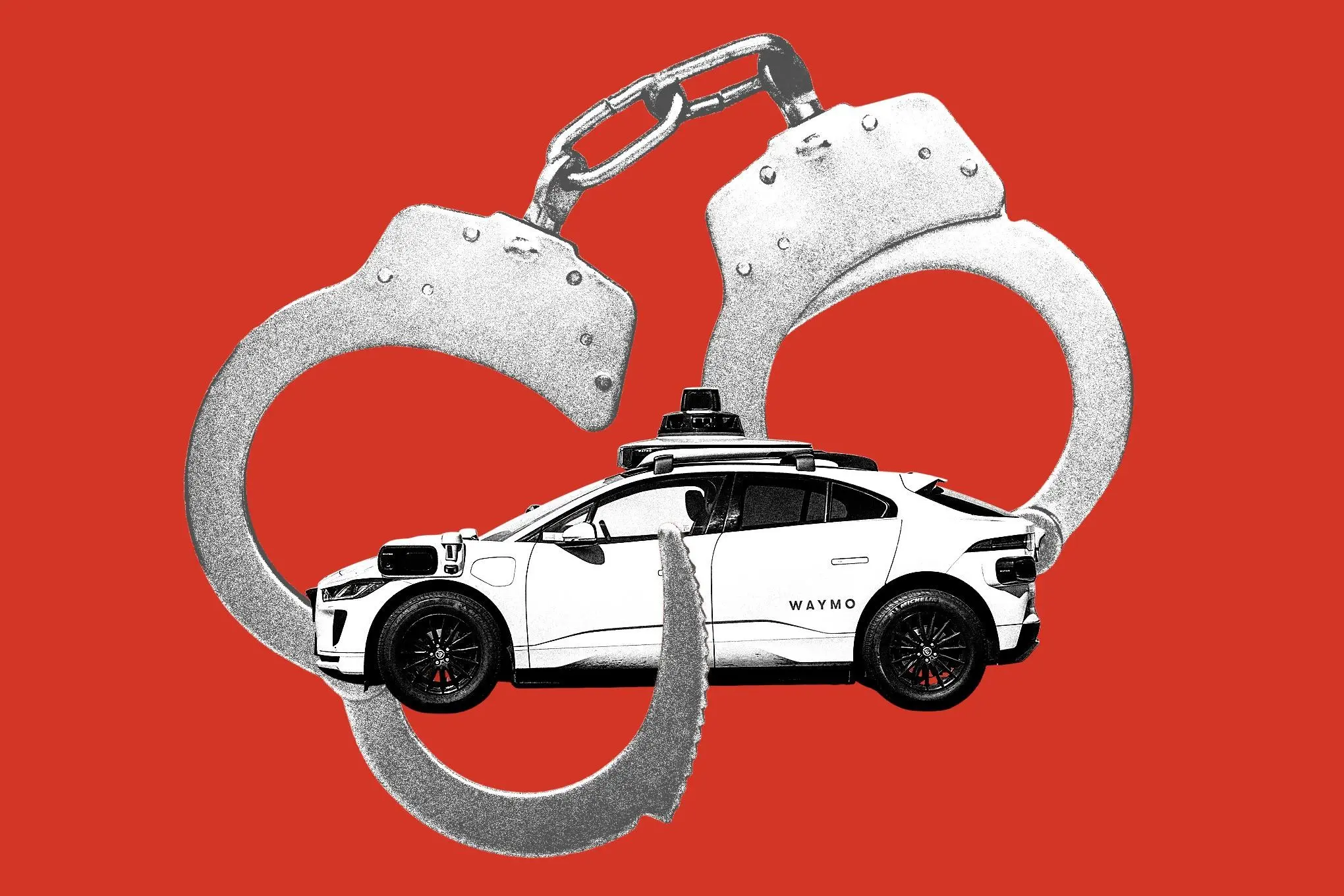 Waymo robotaxi with handcuffs
