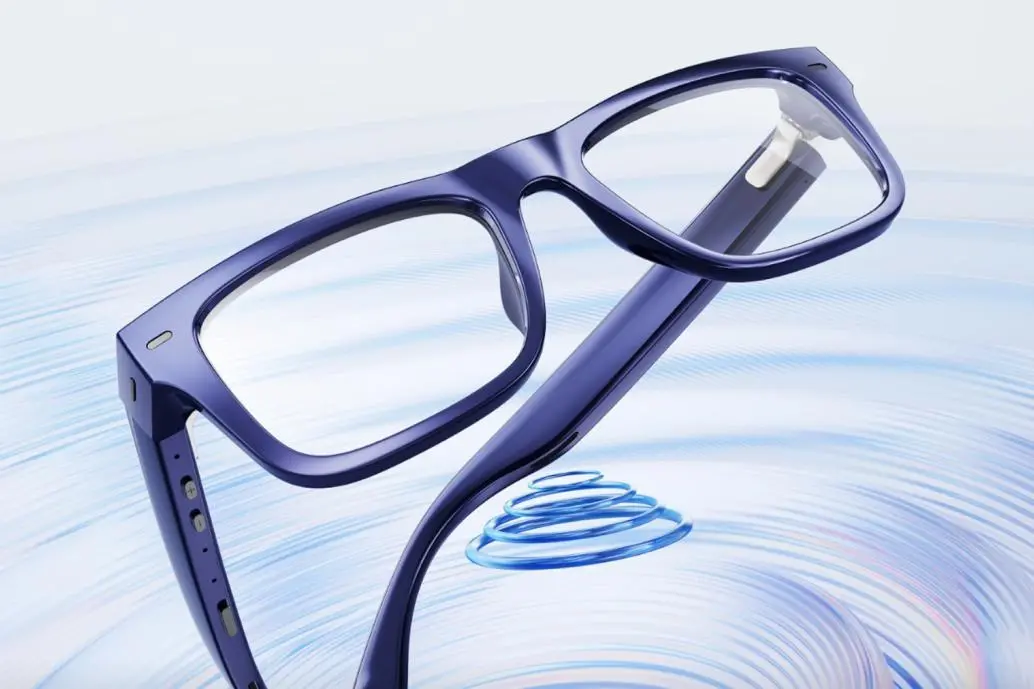 The Nuance Audio Plus smart glasses hovering over an illustration of sound waves.