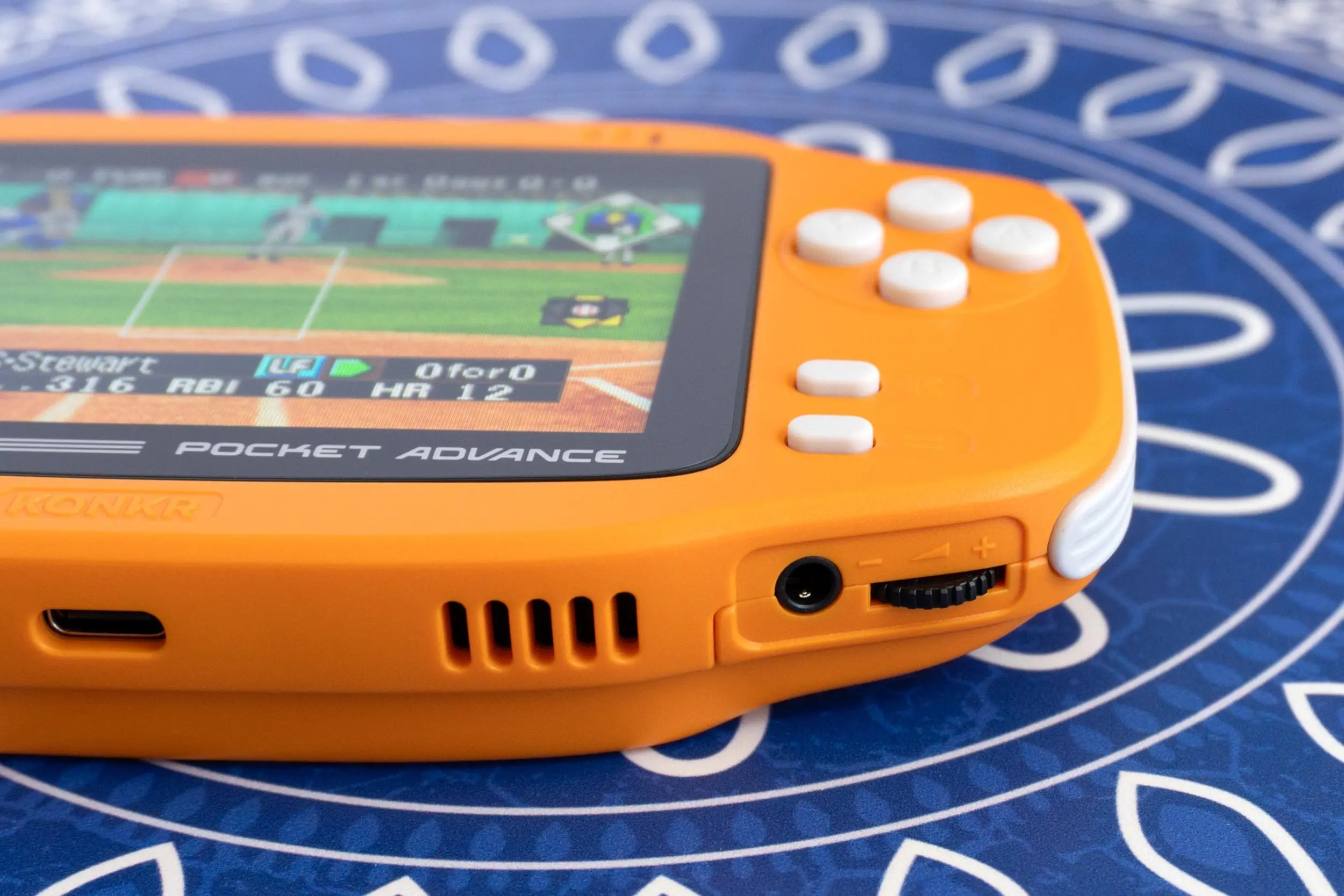 A close-up of the Ayaneo Konkr Pocket Advance’s headphone jack and volume dial control.