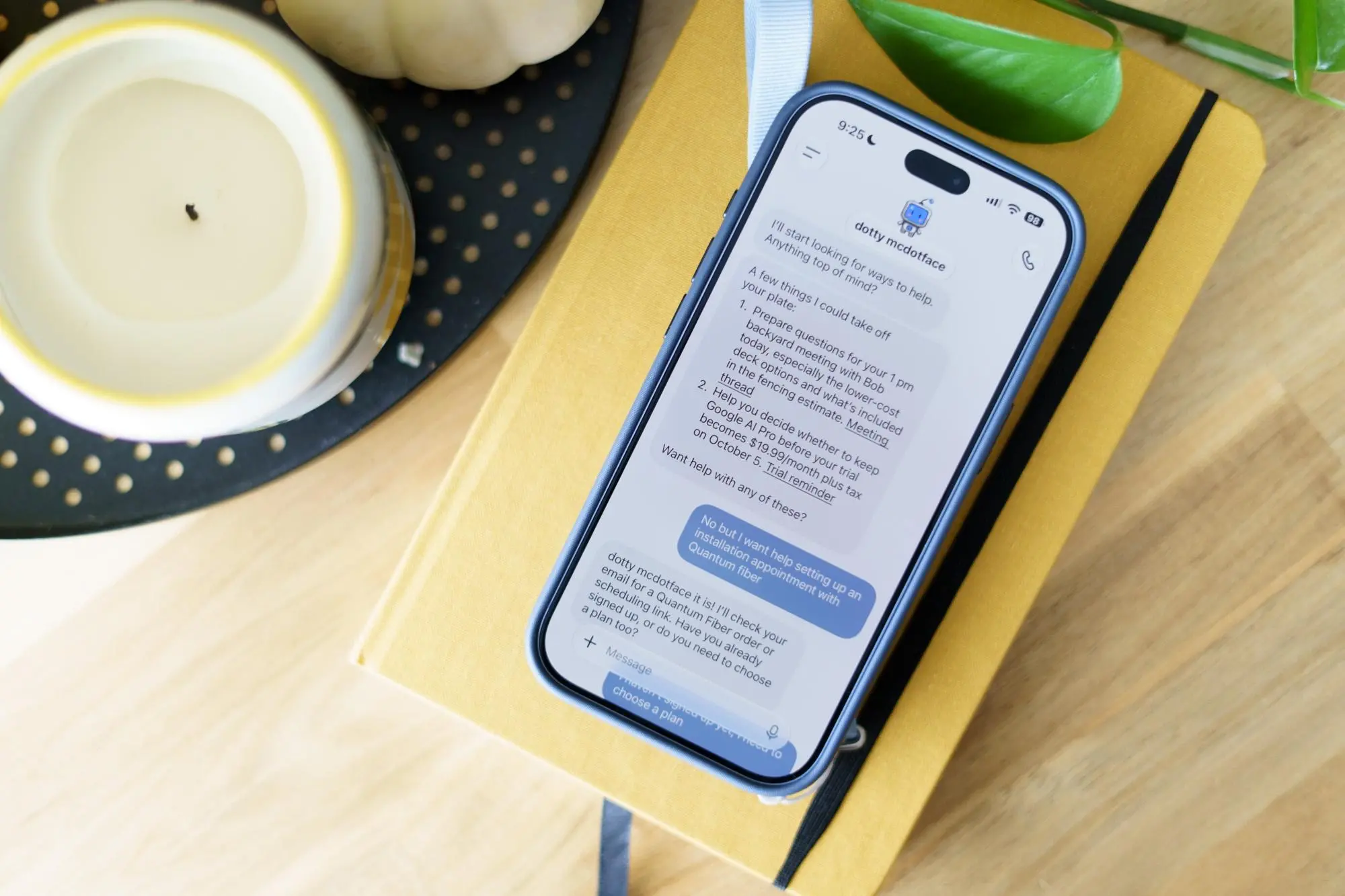 Photo of a phone showing the OpenAI Dots interface