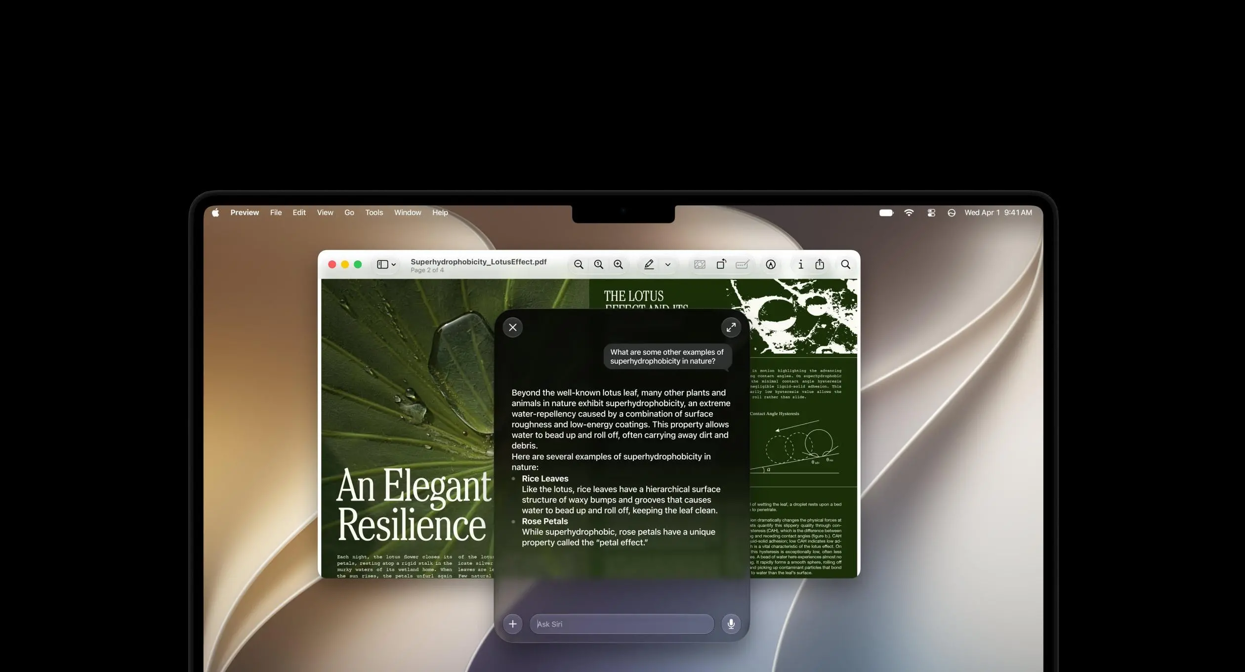 A close-up of a MacBook using Siri AI against a black background.