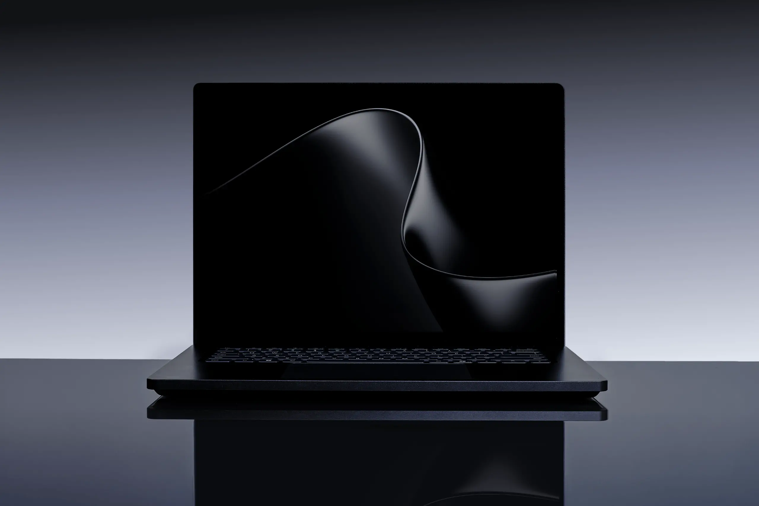 A shadowy image of a Microsoft Surface Laptop Ultra against a gradient gray background.