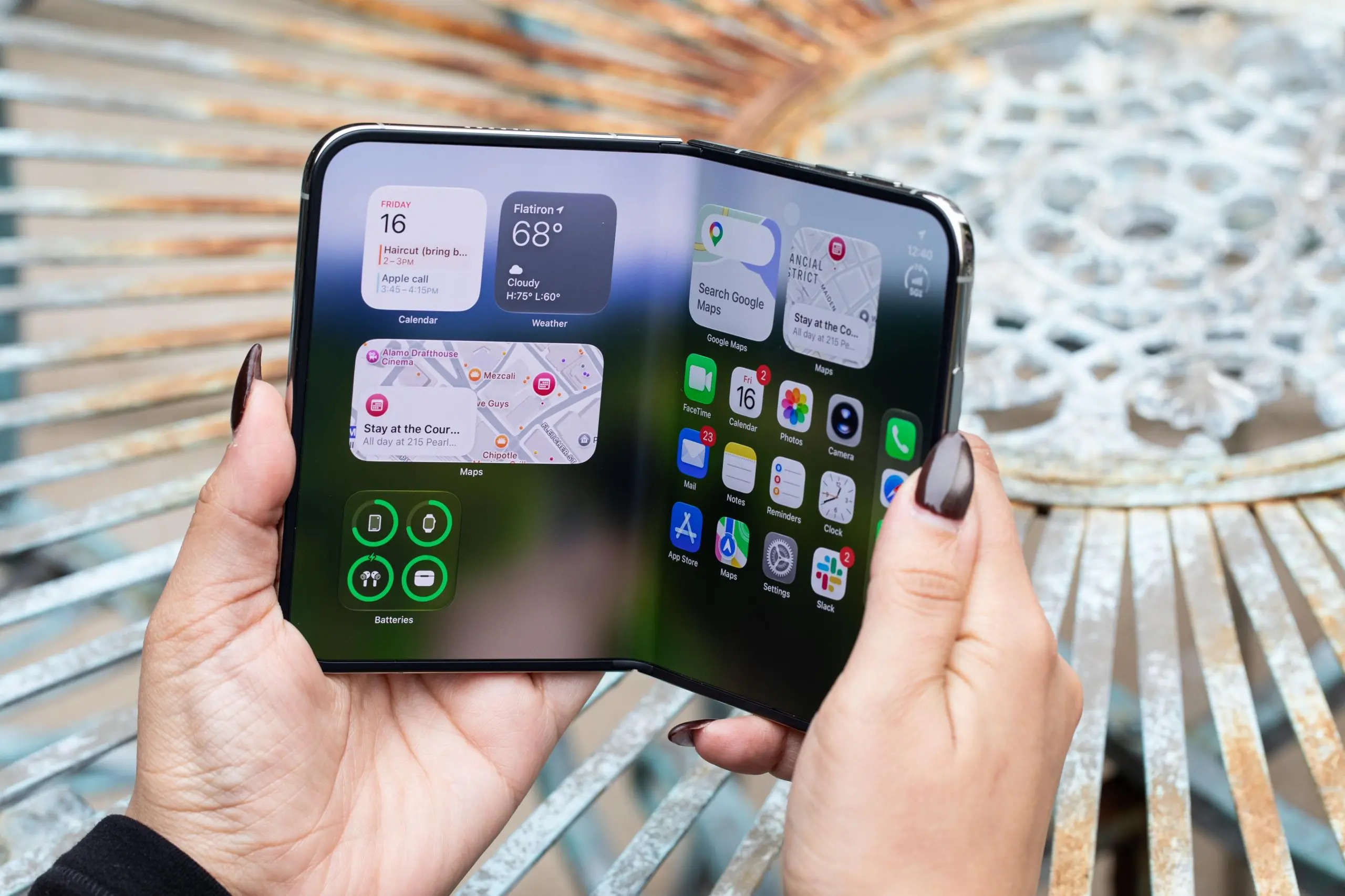 A photo of a person holding the iPhone Duo