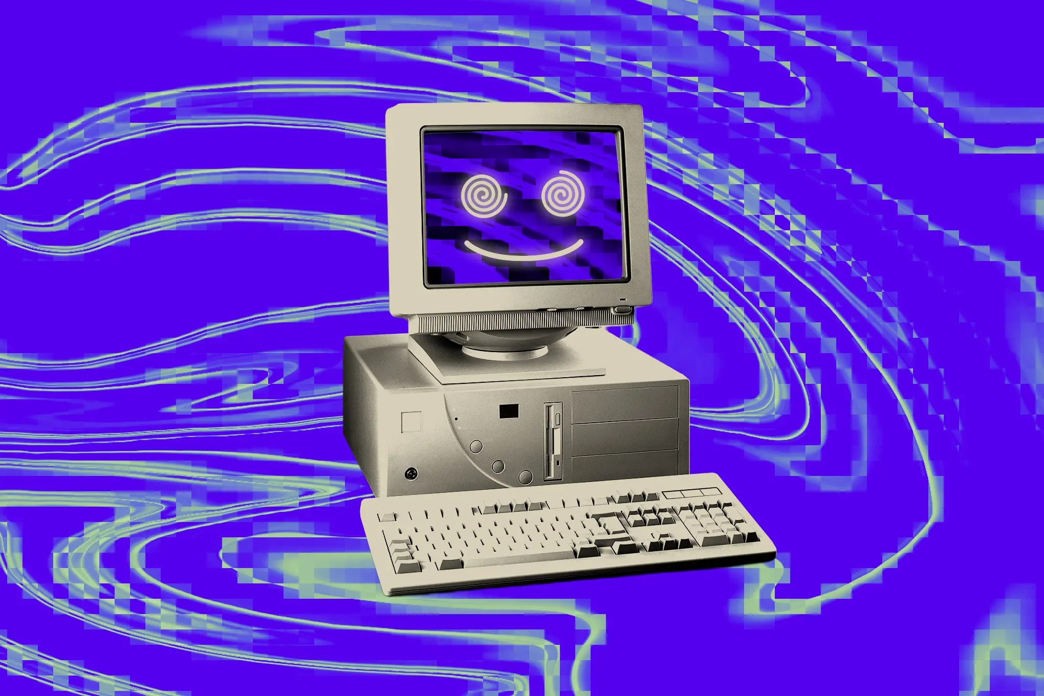 Beige 90s style computer with swirly spiral eyes.